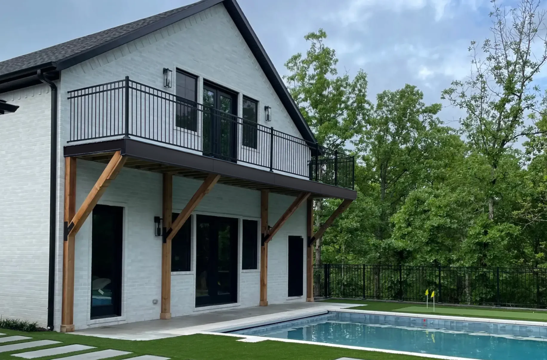 Pool house with outdoor living area in Northwest Arkansas