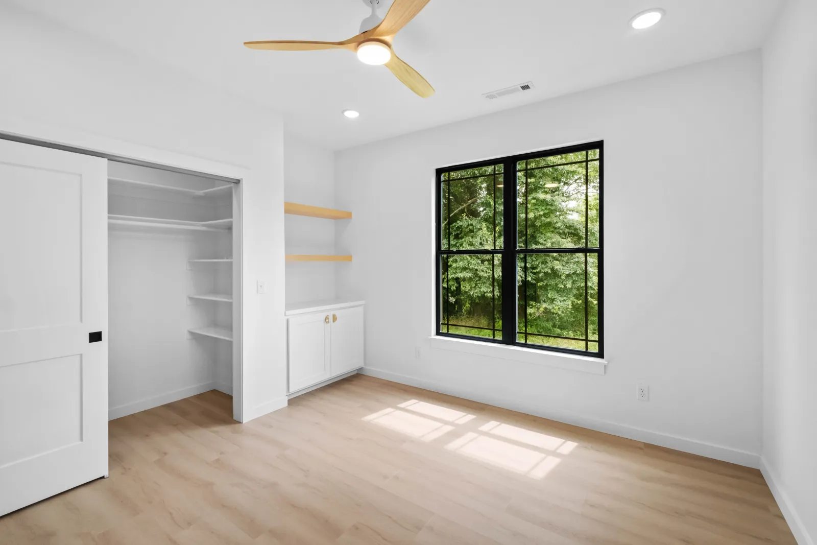 Custom home bedroom by Evergreen Builders in Northwest Arkansas